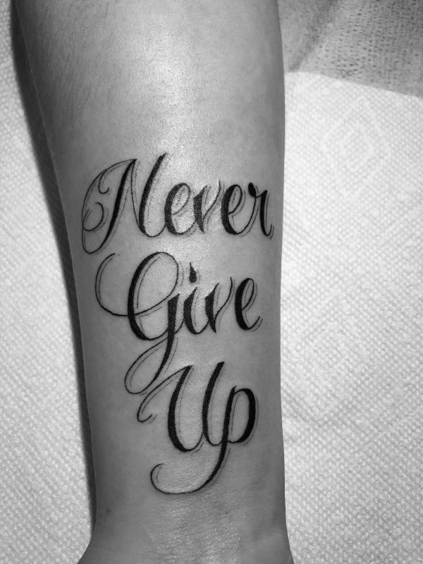 Татуировка never give up