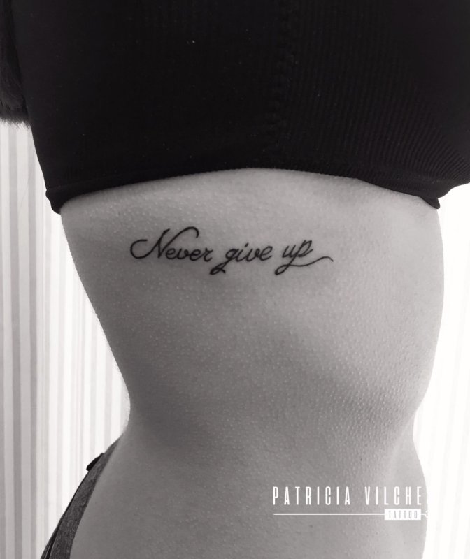 Never give up тату