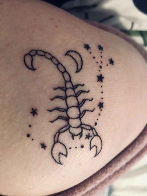 Тату Scorpio надпись