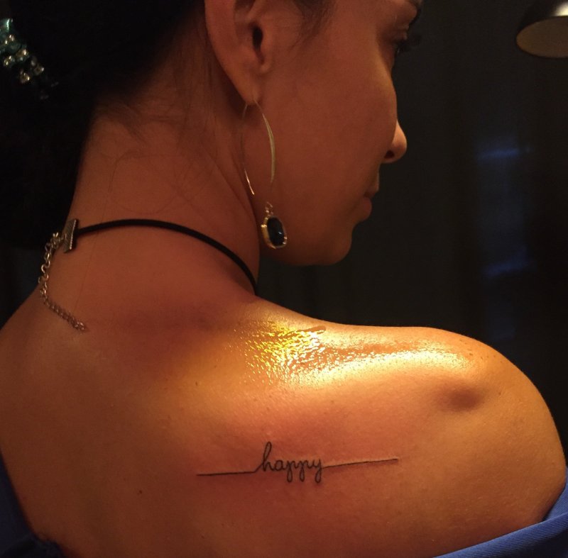 Amor тату на ребрах