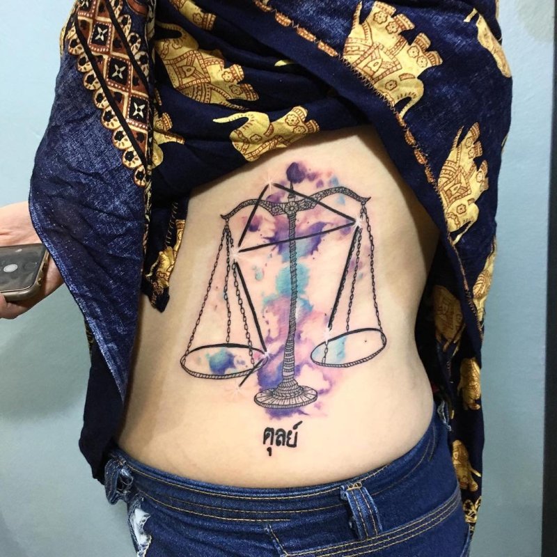 Татто Libra