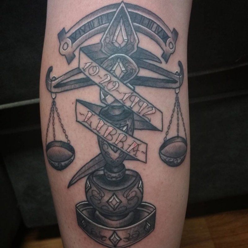Татто Libra