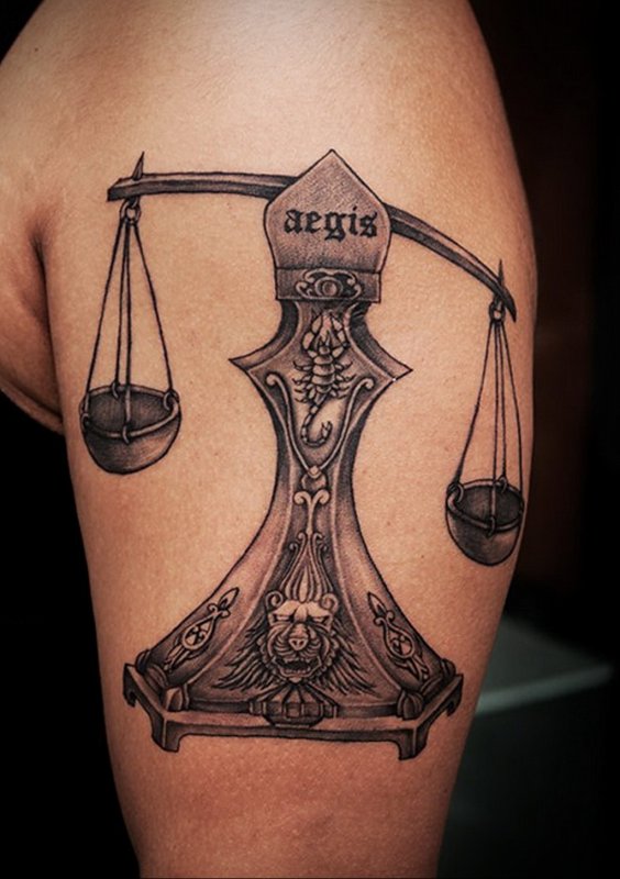 Татто Libra