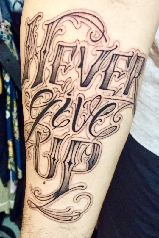 Татуировка never give up