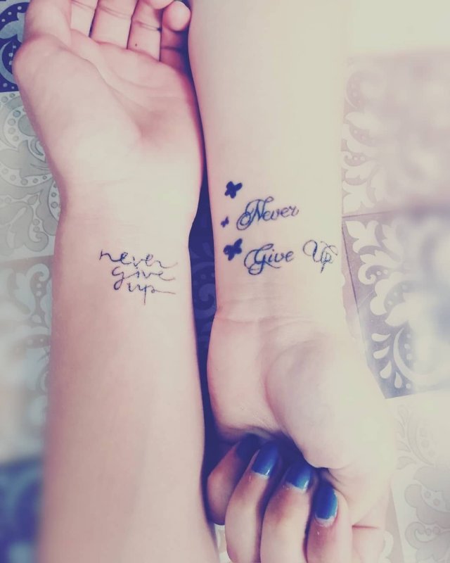 Never give up тату