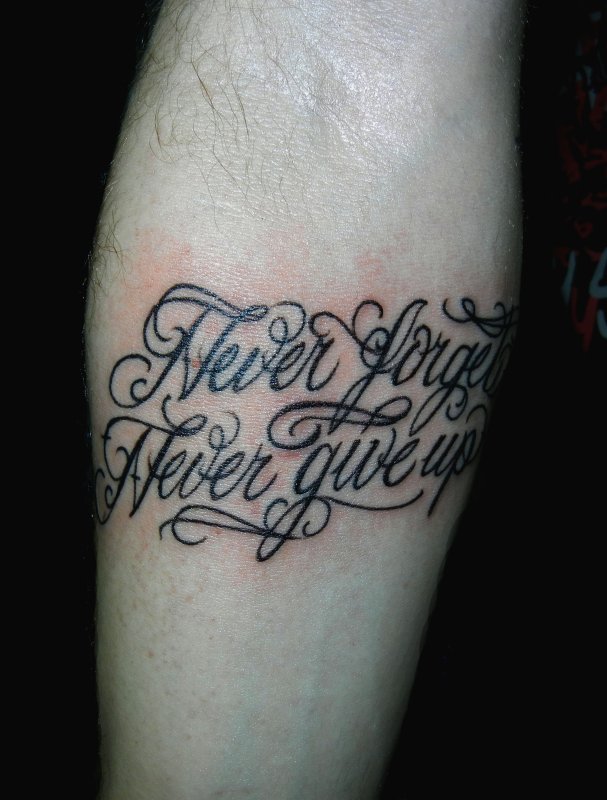 Never give up тату