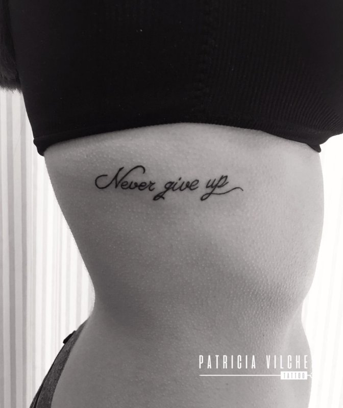 Never give up тату