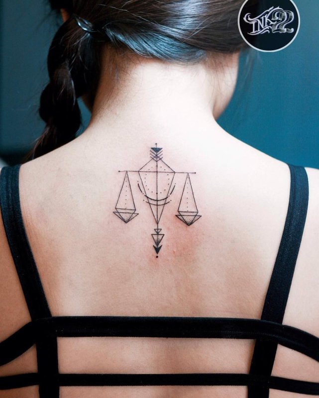 Татто Libra