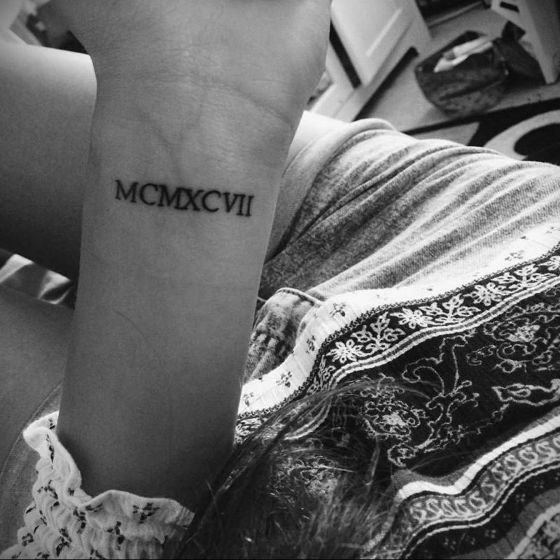 MCMXCVII тату