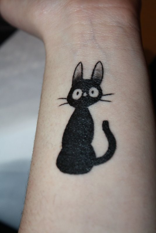 Тату черная кошка