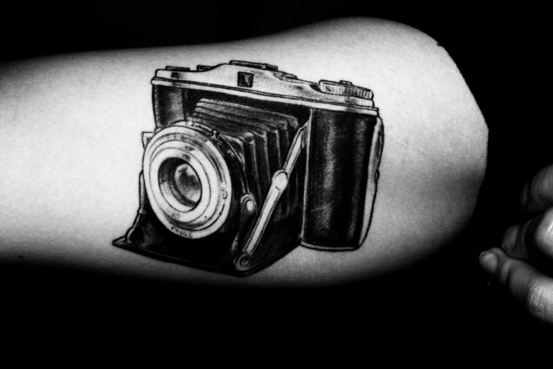 Девушка с фотоаппаратом