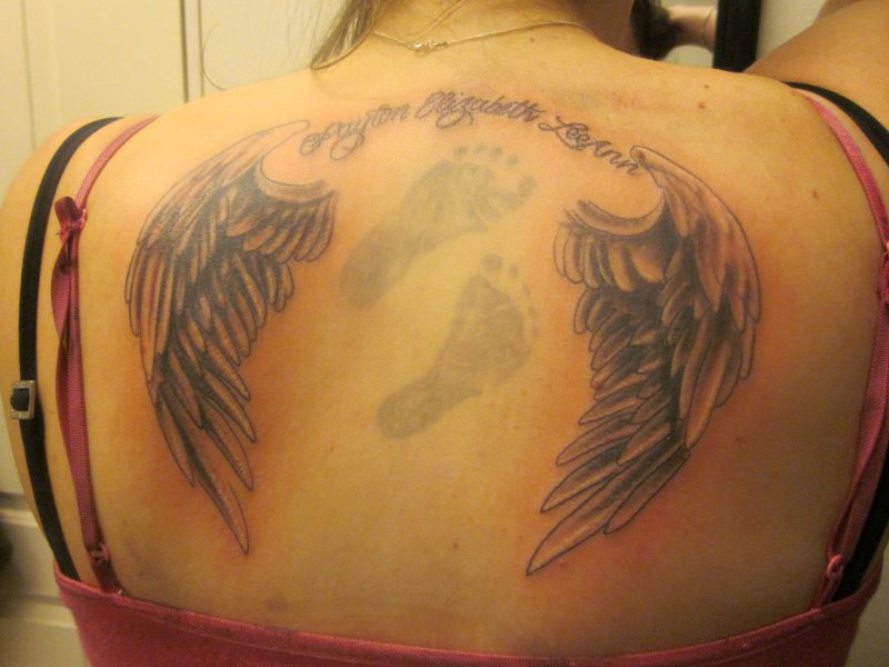 Tattoo девушка с крыльями