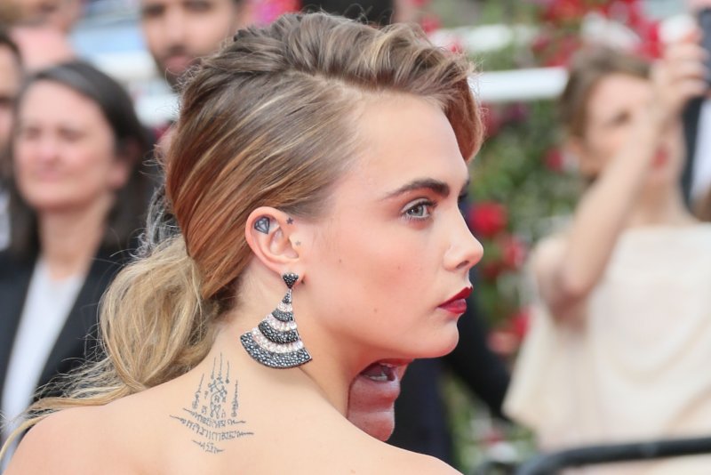 Cara Delevingne Tattoo on feet