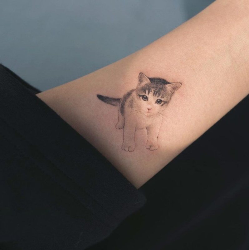 Тату нежная кошка