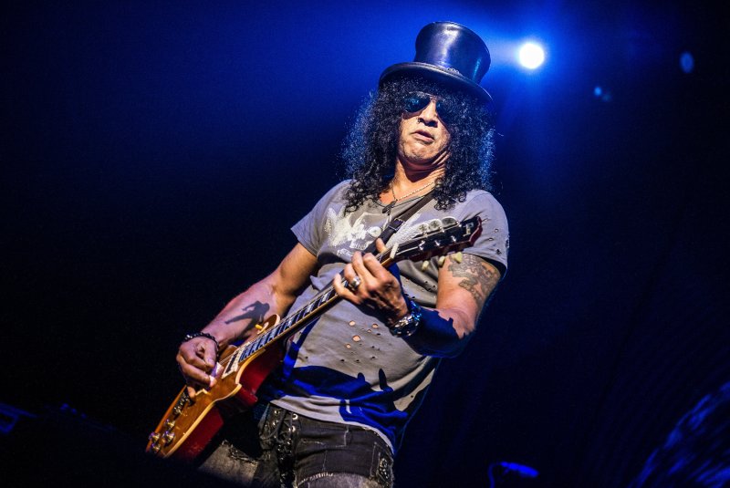 Slash гитарист Татуировка