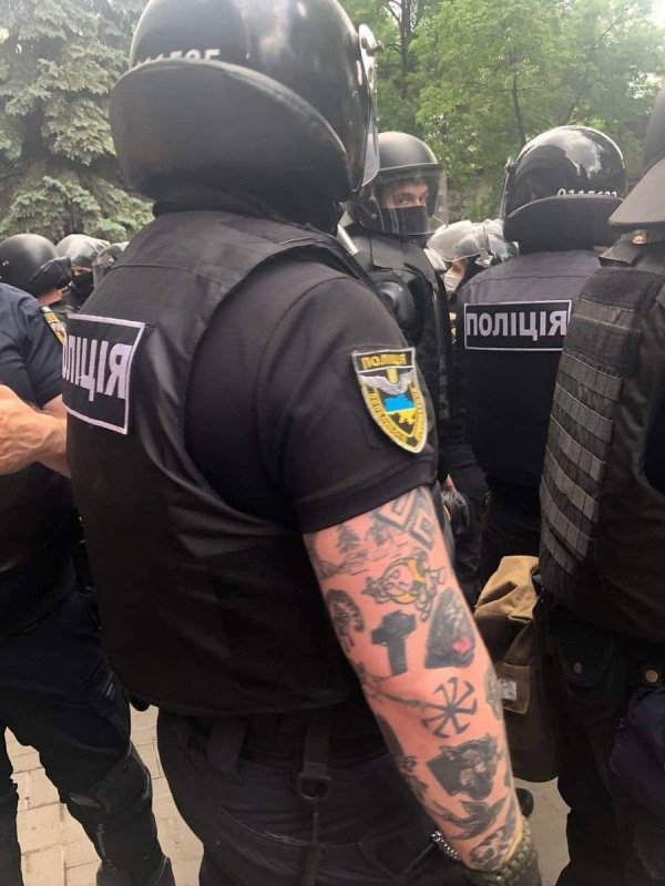 Тату полиция