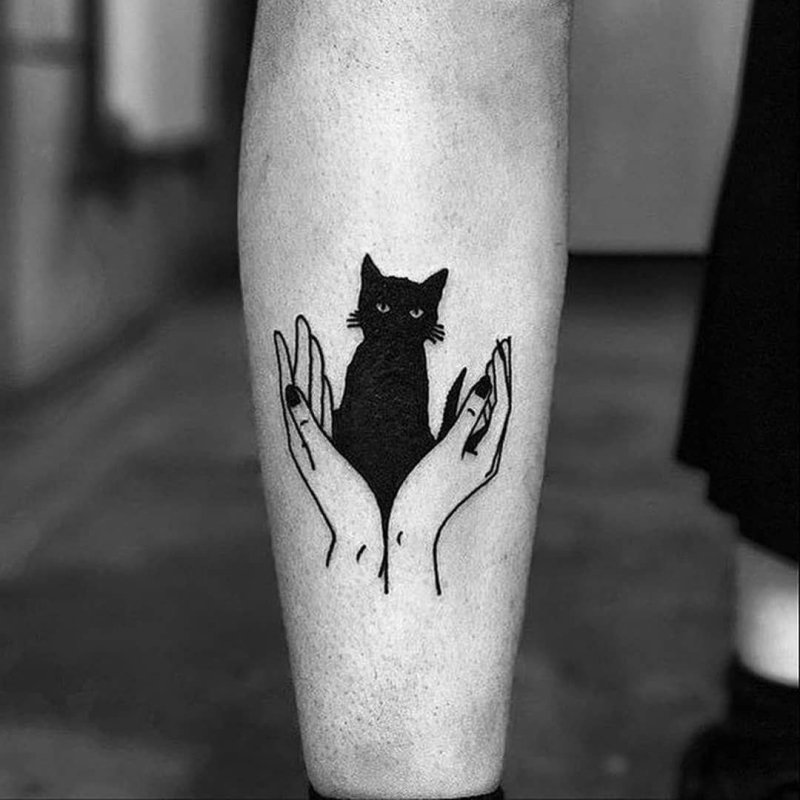 Тату черный кот