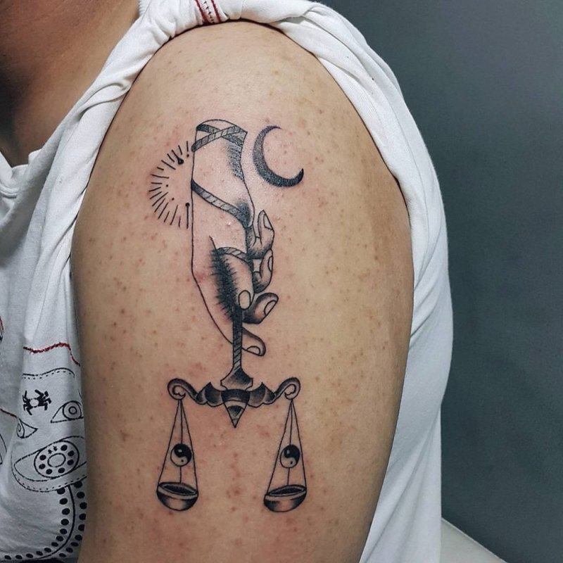 Татто Libra