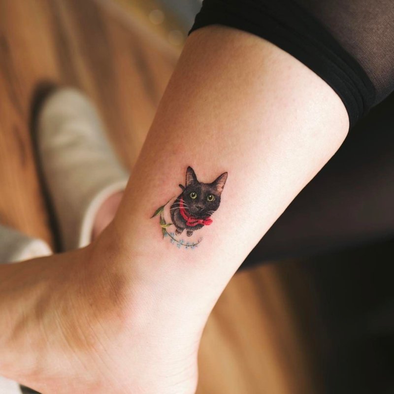Тату черная кошка
