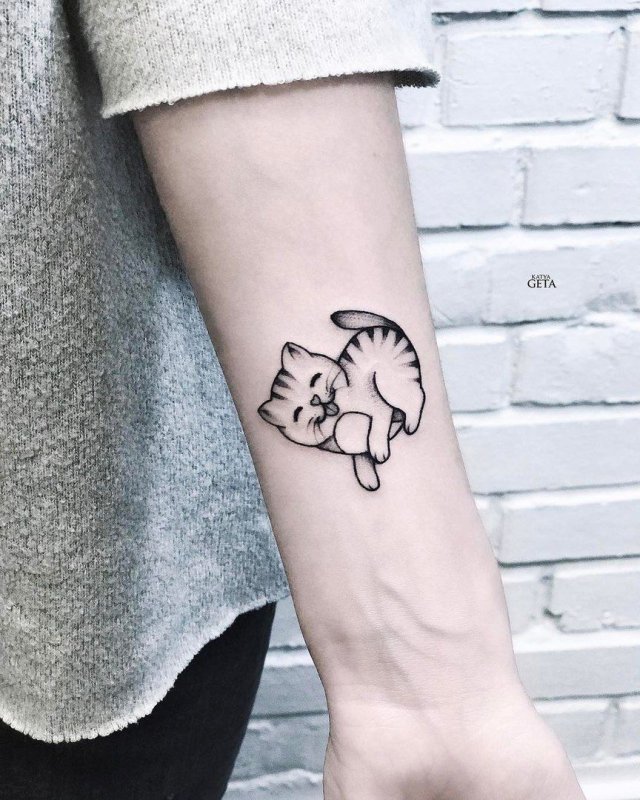 Тату рыжий кот