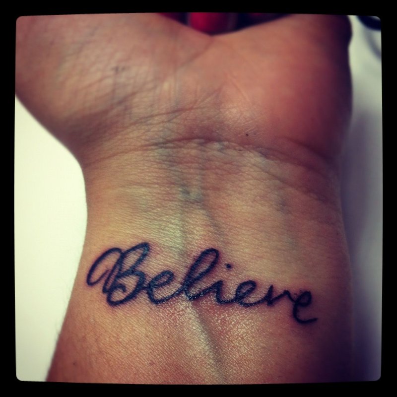 Believe тату на руке