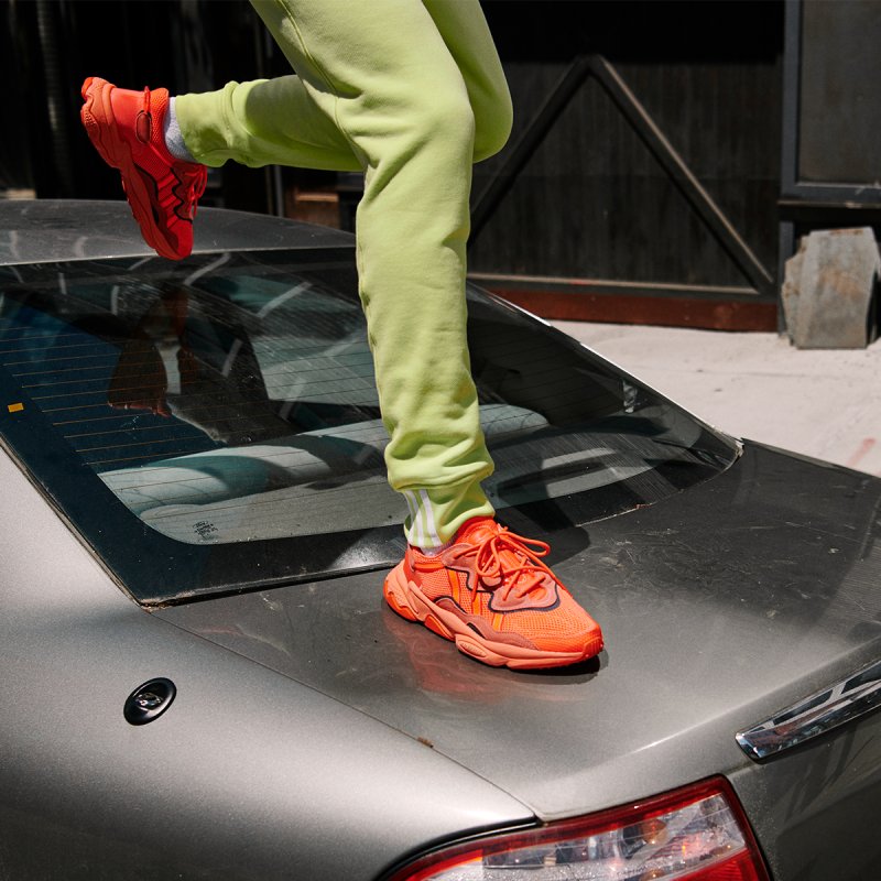 Ozweego Orange on foot